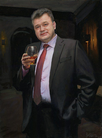 Мужчина с коньяком